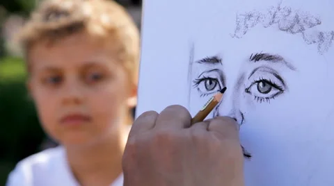 Hand Drawing a Boy Face with Pencil Stock Footage 52155574
