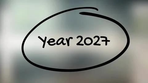 Hand drawing a circle around Year 2027 text on transparent glass Stock Footage 335651742