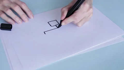 Hand Drawing Genogram On White Paper With Black Pen. High Angle Shot Vidéo 212347385