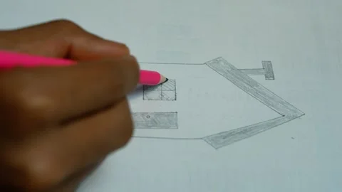 Hand drawing geometric arrow on graph paper, Close-up of a person drawing a.. Stock Footage 346484550