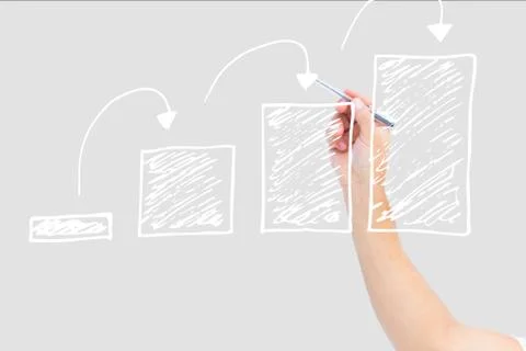 Hand drawing graphics on the screen against white background 스톡 사진