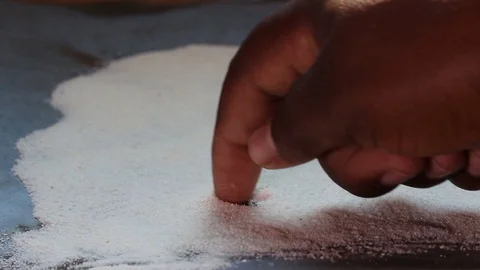 Hand drawing heart in flour Stock Footage 88141750