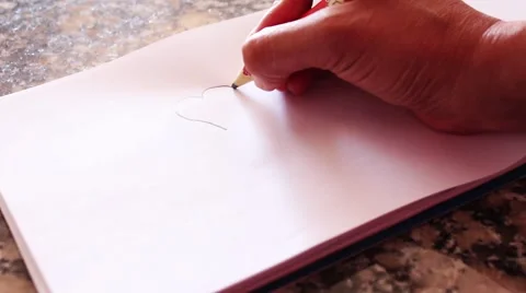 Hand drawing a heart on a plain white paper. full HD 1920x1080 Stock Footage 49433468