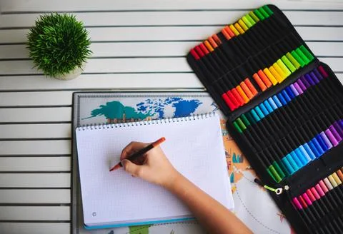 Hand drawing in a notebook with a marker pen case Stock Photos