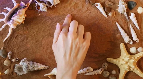 Hand drawing Number Four 4 symbol in the sand. Beach background. Top view Stock Footage 61586734