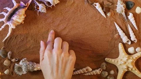 Hand drawing Number one 1 symbol in the sand. Beach background. Top view Stock Footage 61586682