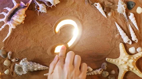 Hand drawing Number two 2 symbol in the sand. Beach background. Top view Stock Footage 61586772
