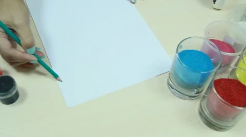 Hand is drawing on the paper 스톡 동영상 49761540