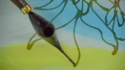 Hand Drawing pattern in wax prior to dyeing in Batik factory Penang Stock Footage 108798443