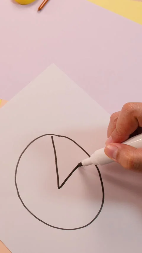 Hand Drawing Pie Chart and Math Symbols on Paper Overhead Stock Footage 322147773
