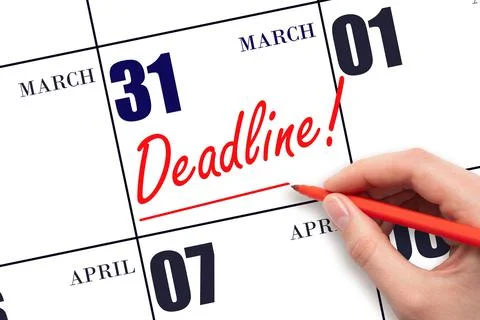 Hand drawing red line and writing the text Deadline on calendar date March 31 Stock Photos