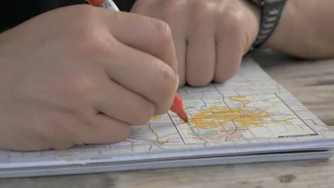 Hand drawing route on paper map for road trip Stock Footage 114070116