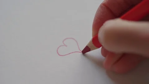 Hand drawing small heart by red pencil for Valentine's day Stock Footage 101304096