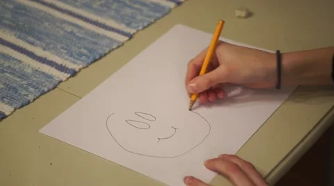 A hand is drawing a smiley. Stock Footage 44802032