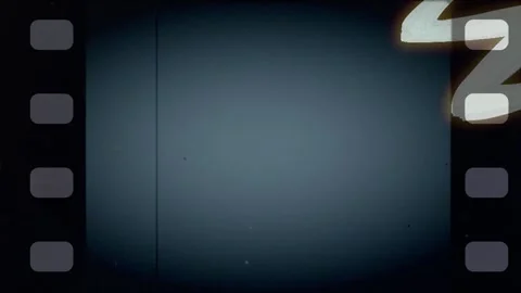 Hand-drawn animation on old 8mm film strip Stock Footage 319484868