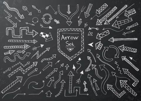 Hand drawn arrow icons set on black chalk board Ilustración de archivo