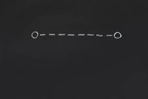 Hand-drawn chalk dotted line on blackboard background Stock Photos