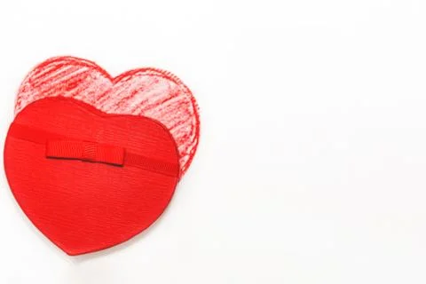 Hand drawn, crayon heart shape and cover of heart shaped gift box Foto stock