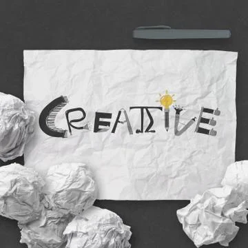 Hand drawn  design word creative on crumpled paper with as concept Stock Illustration
