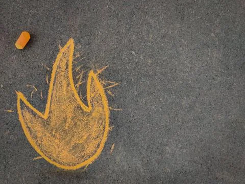 Hand drawn fire emoji. Using color chalk piece Stock Photos
