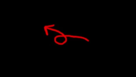 Hand drawn red arrow with a loop motion isolated on a solid black background Video stock 333782870
