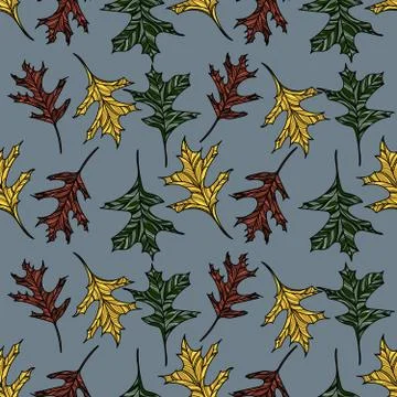 Hand drawn seamless pattern with red, yellow and green oak leaves. Illustrazione stock