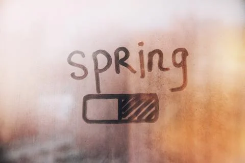 Hand drawn shape accumulator half shaded and word spring on muddy glass wet o Stock Photos