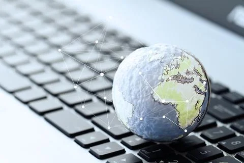 Hand drawn texture globe with social media diagram on laptop computer as in.. Stock Photos