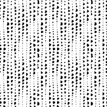 Hand drawn vertical vector dotted lines pattern. Stock Illustration