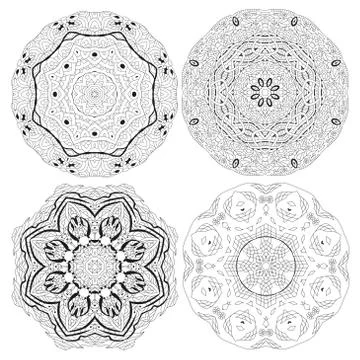 Hand drawn zentangle set of 4 mandalas for coloring page. イラスト素材