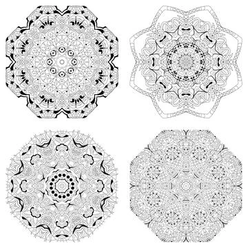 Hand drawn zentangle set of 4 mandalas for coloring page. Illustrazione stock