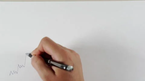 Hand draws bitcoin logo on a piece of paper Stock Footage 157451015