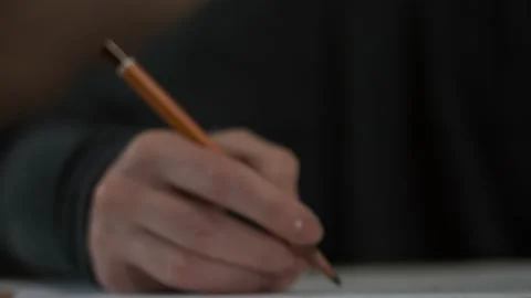 Hand draws close with pencil Stock Footage 147554262