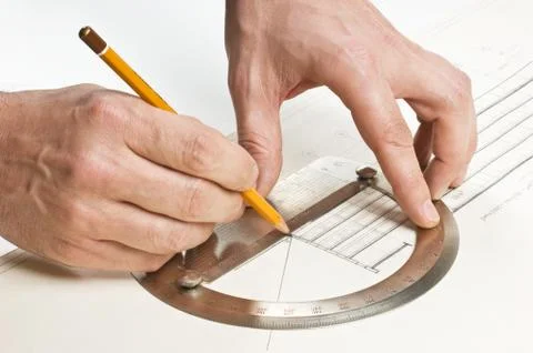 Hand draws a pencil on drawing Stock Photos