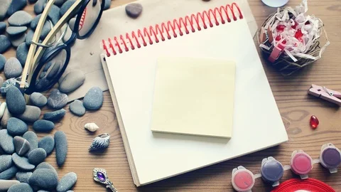 Hand draws a red heart in a notebook. Valentine wish of love. Stock Footage 98140342