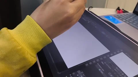 Hand draws sketch on digital tablet with stylus Stock Footage 339429230