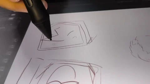 Hand draws sketch on digital tablet with stylus Stock Footage 340130139