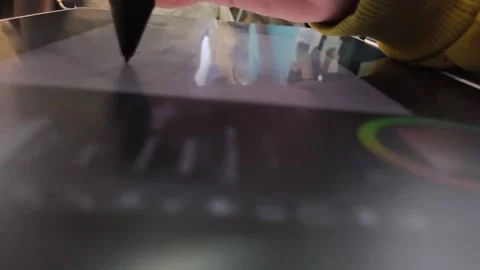 Hand draws sketch on digital tablet with stylus Stock Footage 340142481