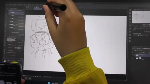 Hand draws sketch on digital tablet with stylus Stock Footage 340142877