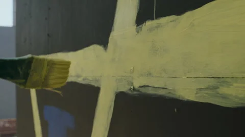Hand draws a yellow line Stock Footage 261413848