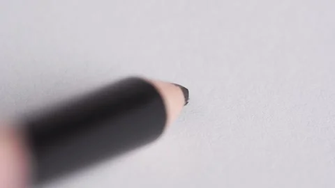 Hand drew a smiley on white paper.  A pencil draws a smiley face Stock Footage 258916916