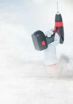 Hand with drill and transition effect Stock Photos
