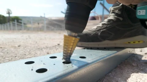 Hand Drill Drilling Into Metal in Slow Motion Stock Footage 346877399
