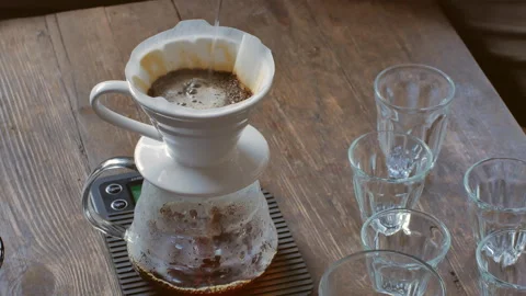 Hand drip coffee, Tourists with drip coffee, black coffee, Camping place. Video stock 144521134