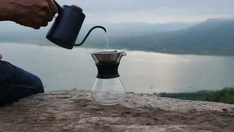 Hand drip coffee,Tourists with drip coffee Stock Footage 140761435