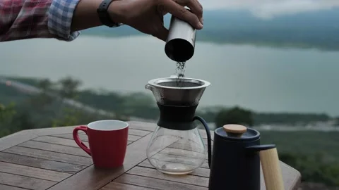 Hand drip coffee,Tourists with drip coffee Stock Footage 140761929