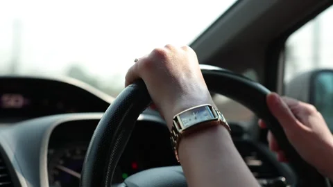 Hand drive a car on the road Stock Footage 271486823