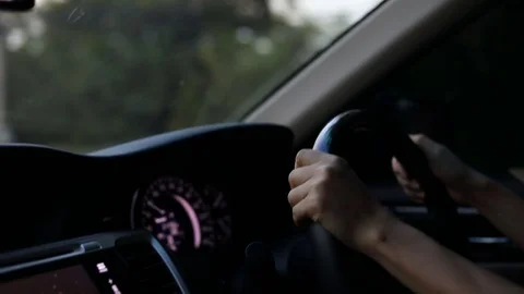 Hand driver control steering wheel driving car Stock Footage 82374005