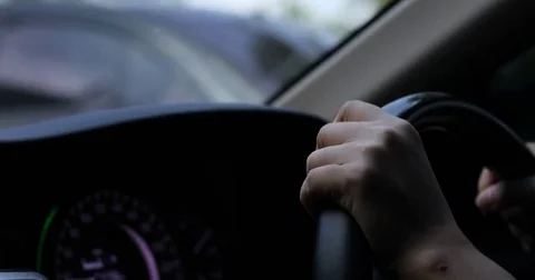 Hand driver control steering wheel driving vehicle car Stock Footage 82786634