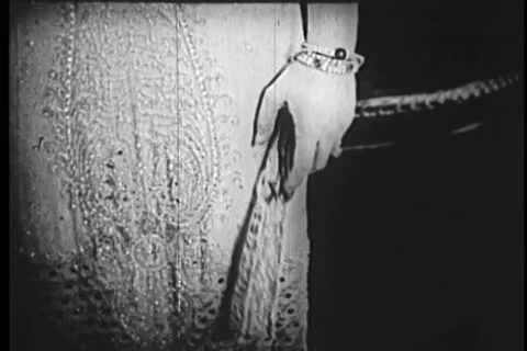 Hand dropping fan on floor Stock Footage 11351832